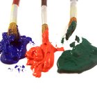 Portrait of a boy painted hands