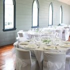 Bride And Groom Enjoying Meal At Wedding Reception
