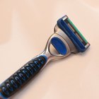 Man using electric shaver