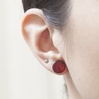 Profile of smiling man with earring