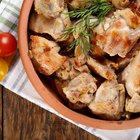 Overhead photo of meat and mushrooms ragout with herbs