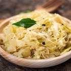 Creamy cauliflower garlic rice in a bowl on a wooden table