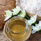 A jar of coconut oil on a wooden table