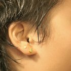 Profile of smiling man with earring