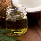A jar of coconut oil on a wooden table