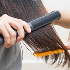 Woman getting hair styled