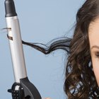 Woman blow drying her hair