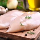 Ready to cook raw seasoned squab with bacon on crumpled