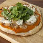 Chef making pizza on table, elevated view
