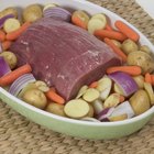 Cooked meat on rustic textures with seasoning
