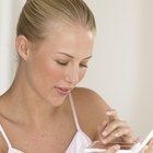 Woman applying blush