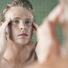 Woman applying moisturizer