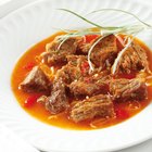 Beef steak on wooden table