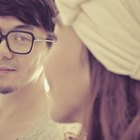 Asian woman smiling at boyfriend