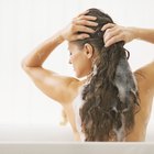 Young woman applying beauty product
