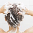 Pretty young girl is receiving hair treatment