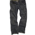 Woman's rear end sitting on barstool in jeans, Curacao