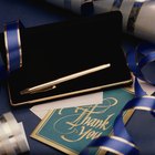 Gold pen in case and thank you card