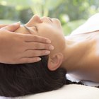 Rolled-up towel on massage table