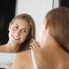 middle-aged woman smiling peacefully with eyes closed