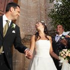 Bride And Groom Enjoying Meal At Wedding Reception
