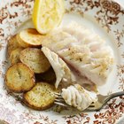 Chilean Sea Bass with potatoes and vegetables on the patio