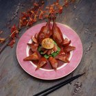 Roast duck with potato dumplings and white cabbage