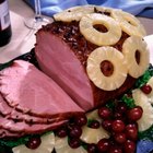 A roast ham dinner with vegetables