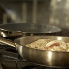 Creamy cauliflower garlic rice in a bowl on a wooden table