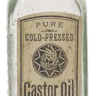 Masseuse pouring massage oil on hands