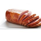 Man slicing Dalmatian prosciutto