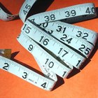 close-up of a woman measuring her bust