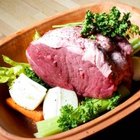 Overhead photo of meat and mushrooms ragout with herbs