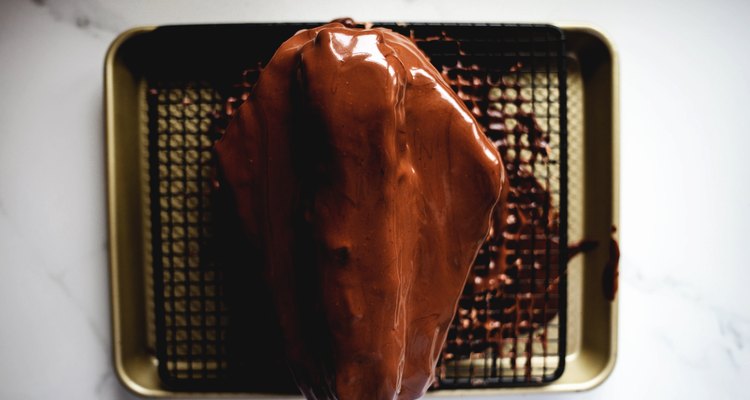 Pour the chocolate glaze over the entire cake.