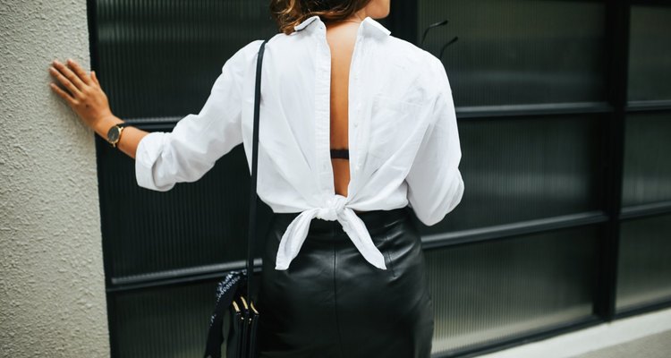 white shirt tied back to front