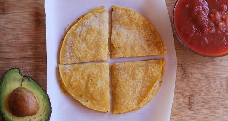 Quesadilla cut into four pieces.