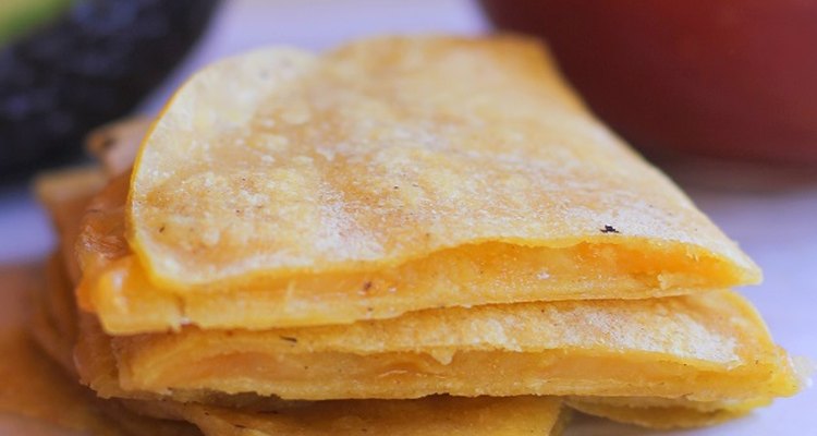 Finished quesadilla wedges with salsa.
