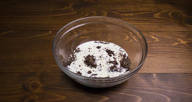Hot cream just poured over chopped chocolate