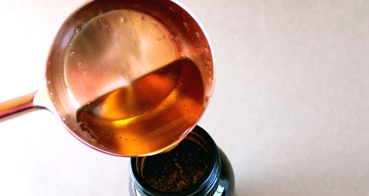Add olive oil and jojoba oil | DIY Men's Pre-Shave Oil