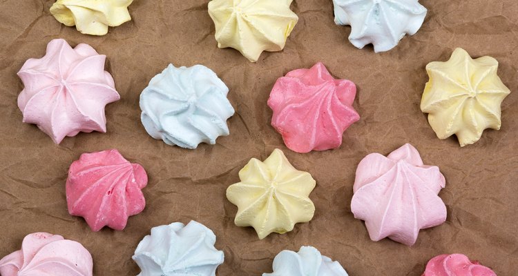 Meringues on crumpled paper top view