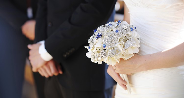 Bride holding flowers at the wedding ceremony