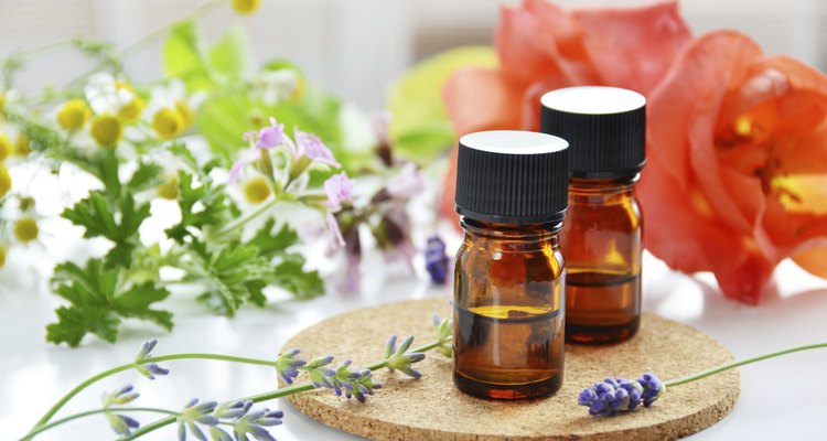 essential oils with herbal flowers