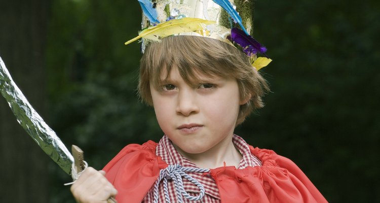 Boy in costume with toy sword
