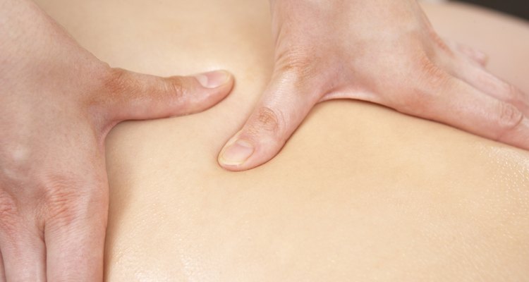 Close Up of female masseuse with client