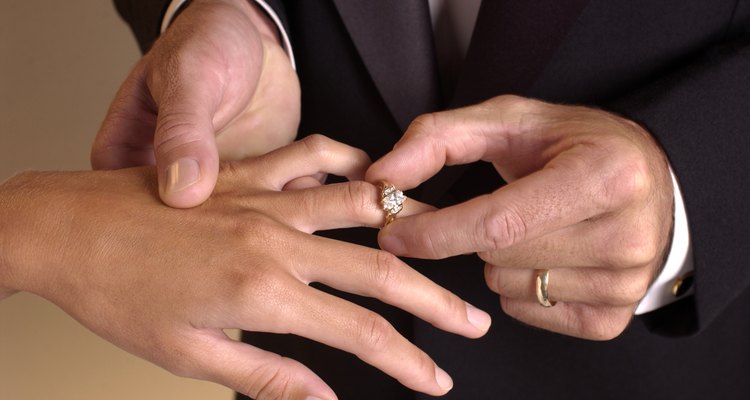 Hands with wedding rings