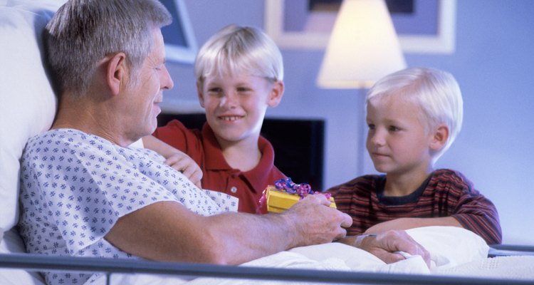Grandchildren visiting grandfather in hospital