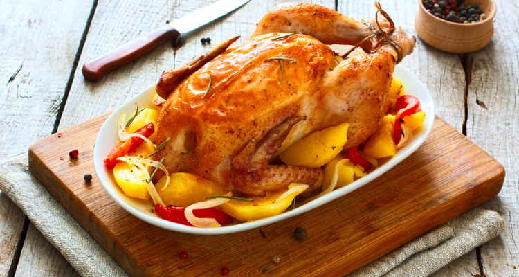 Fried whole chicken with vegetables