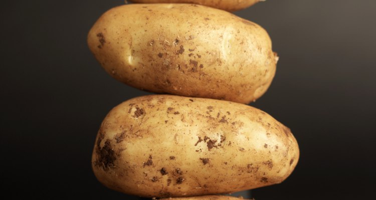Close-up of potatoes stacked high on top of each other