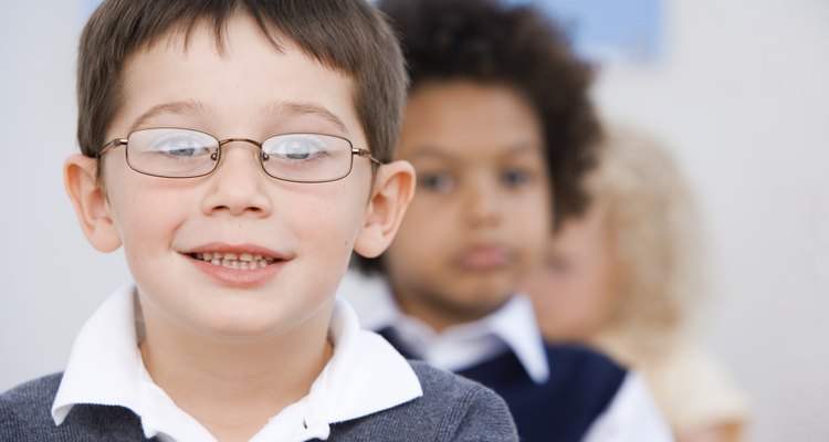 Smiling boy with others