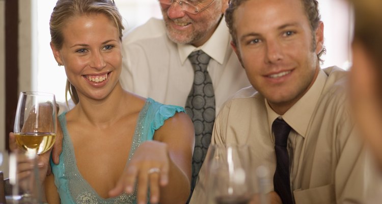 Woman showing off engagement ring